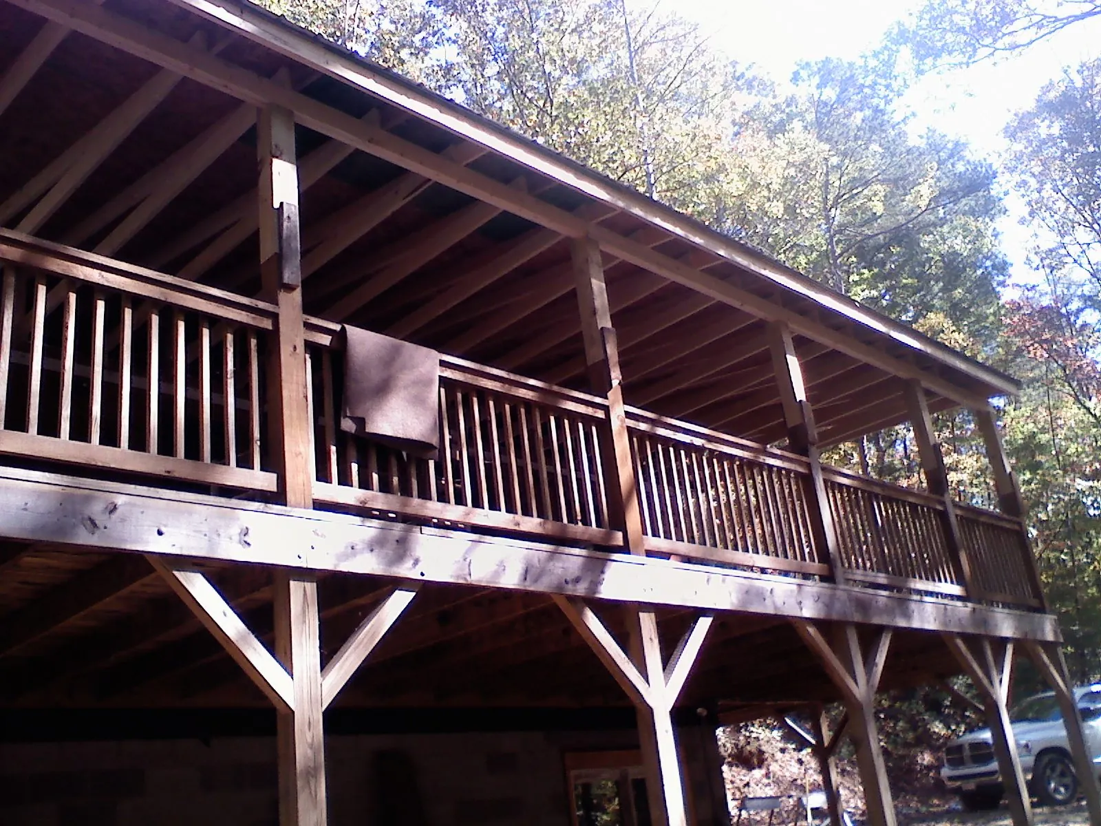 Timber framing under a new elevated porch and deck — Roof Leak Repair in Bedrock by Roofing Brothers